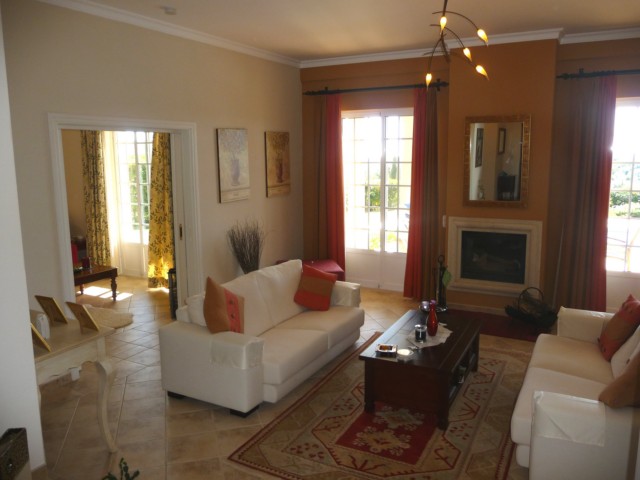 Spacious living room with fwood burner stove