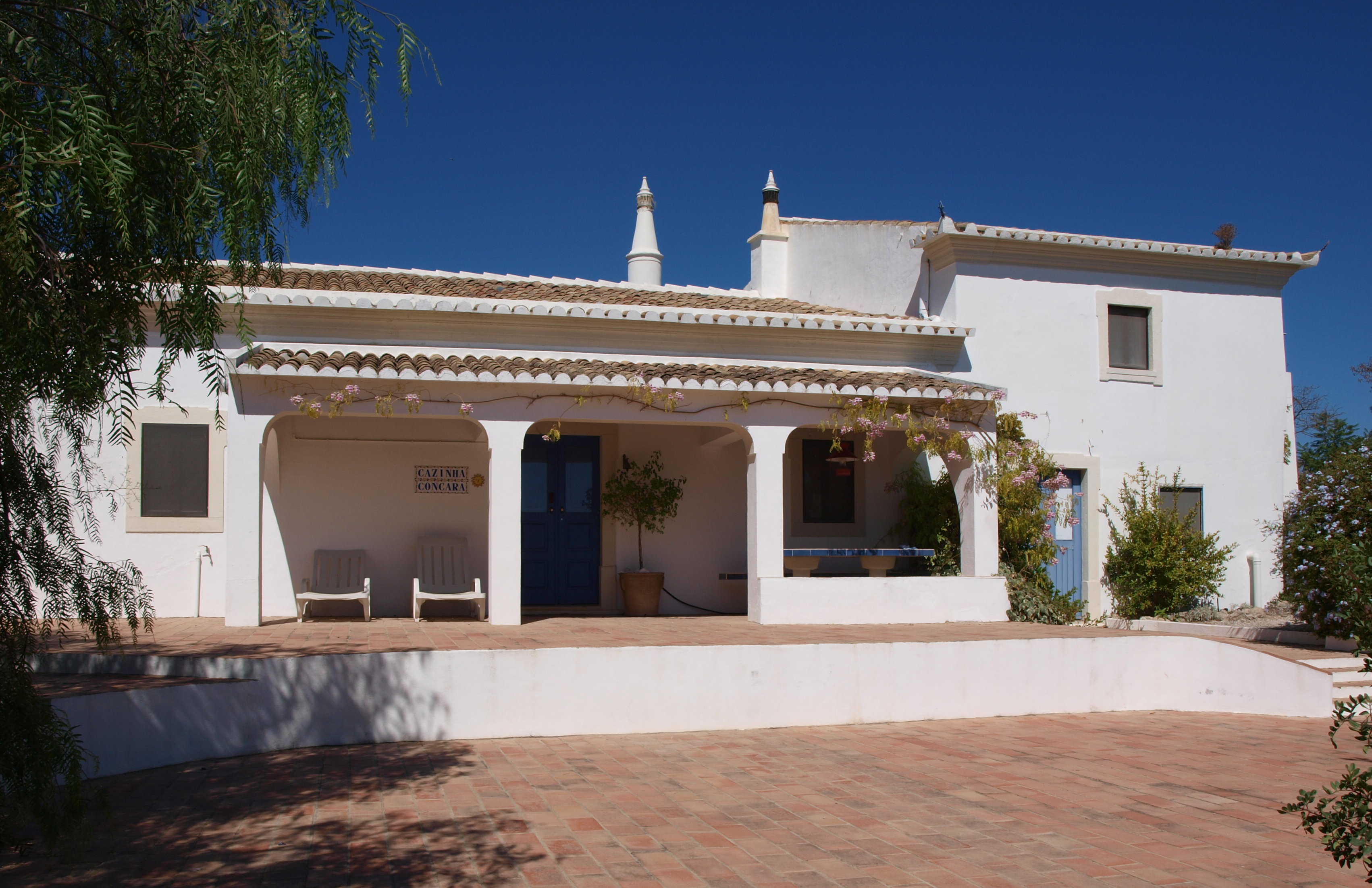 An authentic rustic-style 4-bedroom villa with pool